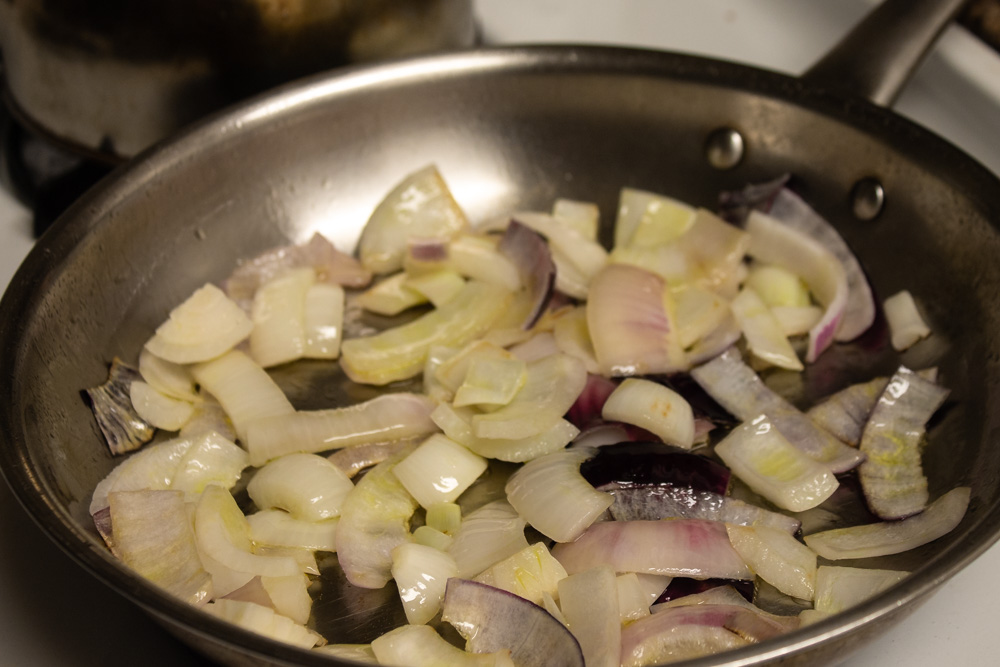 Cooking onions in a pan
