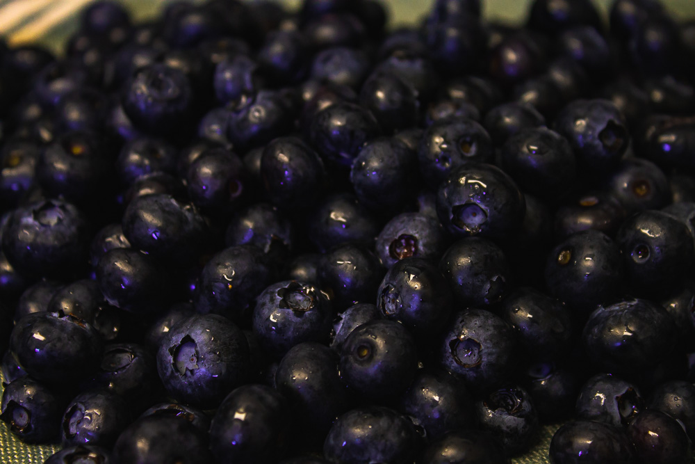 Large pile of blueberries