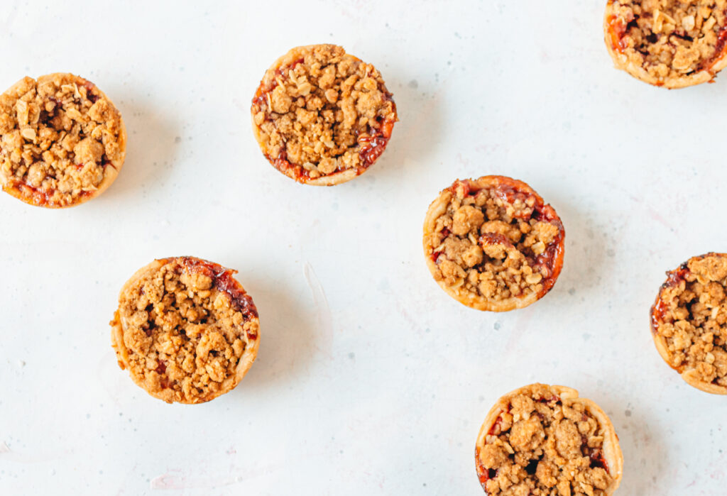 Top view of 7 strawberry rhubarb crisps