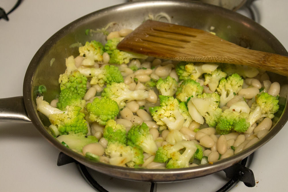 Pan of romanesco and white beans