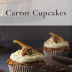 Two carrot cupcakes with some on stand