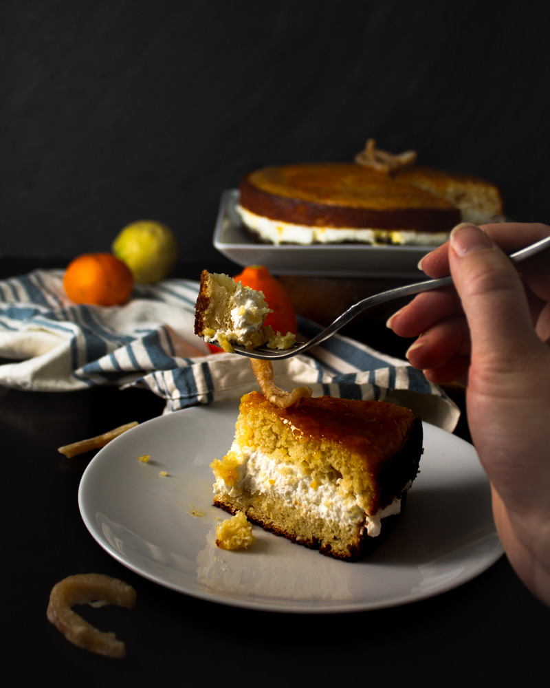 Biting into cake with a fork