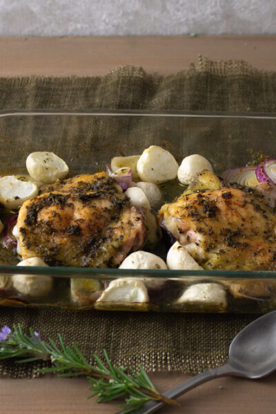 Spring turnips and herbed chicken in baking dish