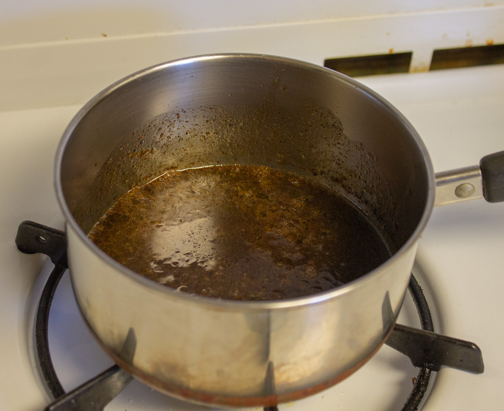 Reducing marinade in saucepan