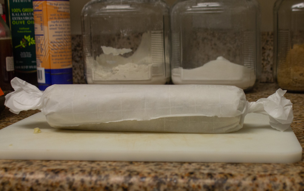 Dough roll wrapped in parchment