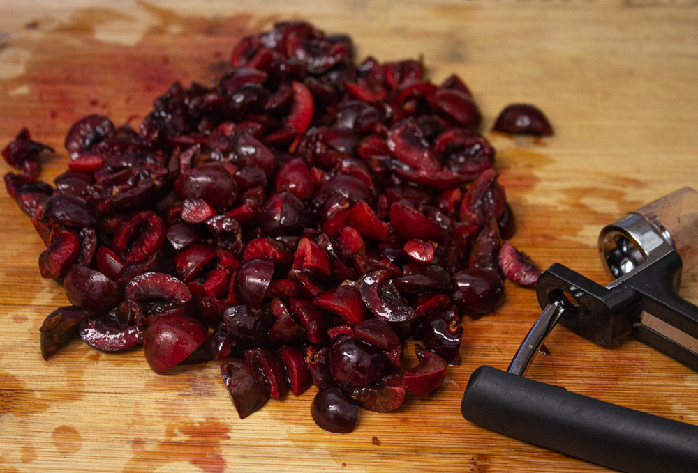 Chopped cherries on a cutting board