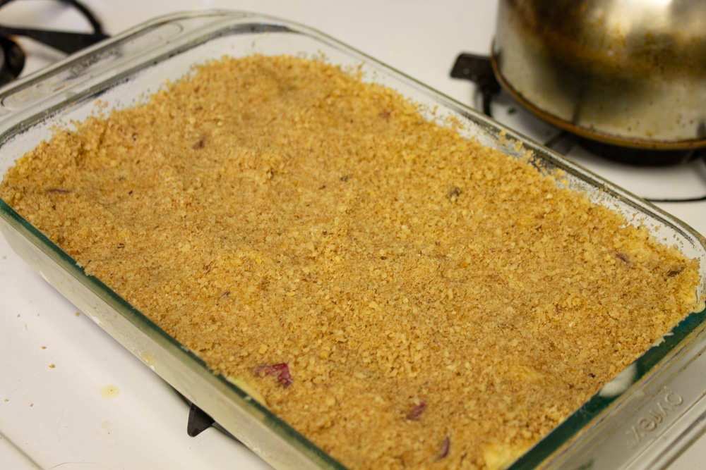 Rhubarb cake in pan ready to bake