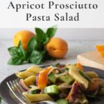 Apricot pasta salad on grey plate