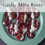 Garlic Mint Roasted Beets on green plate