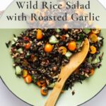 Overhead shot of wild rice salad with text
