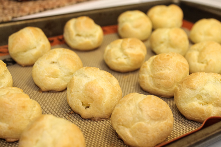 Baked puffs on baking sheet