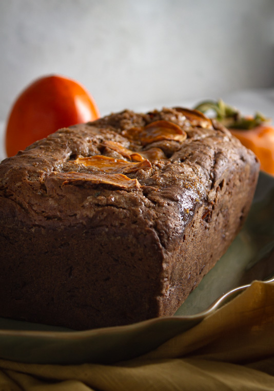 Loaf of persimmon bread back lit