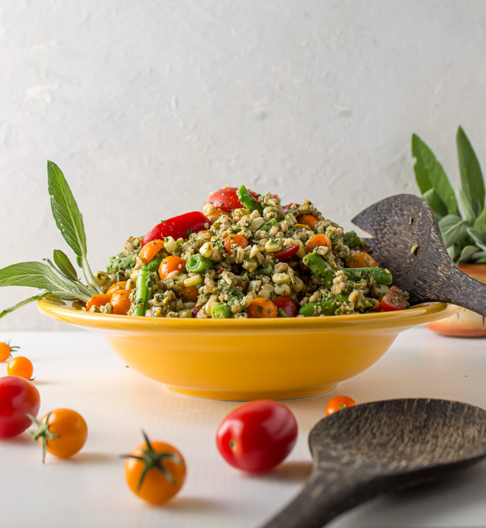 Sage pesto farro salad in yellow bowl