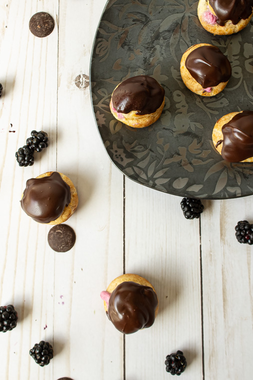 Overhead shot of blackberry cream puffs