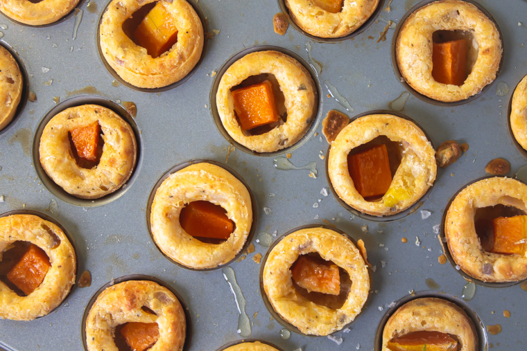 Overhead shot of tapioca cheese bread with butternut in pan