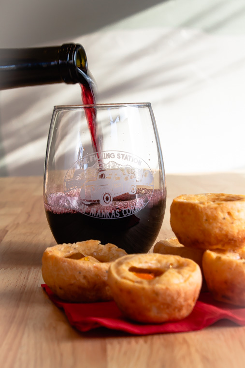 Dal Cuore pouring into glass with tapioca cheese bread