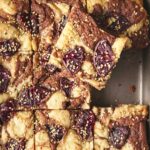 Overhead view of blood orange tahini blondies in pan